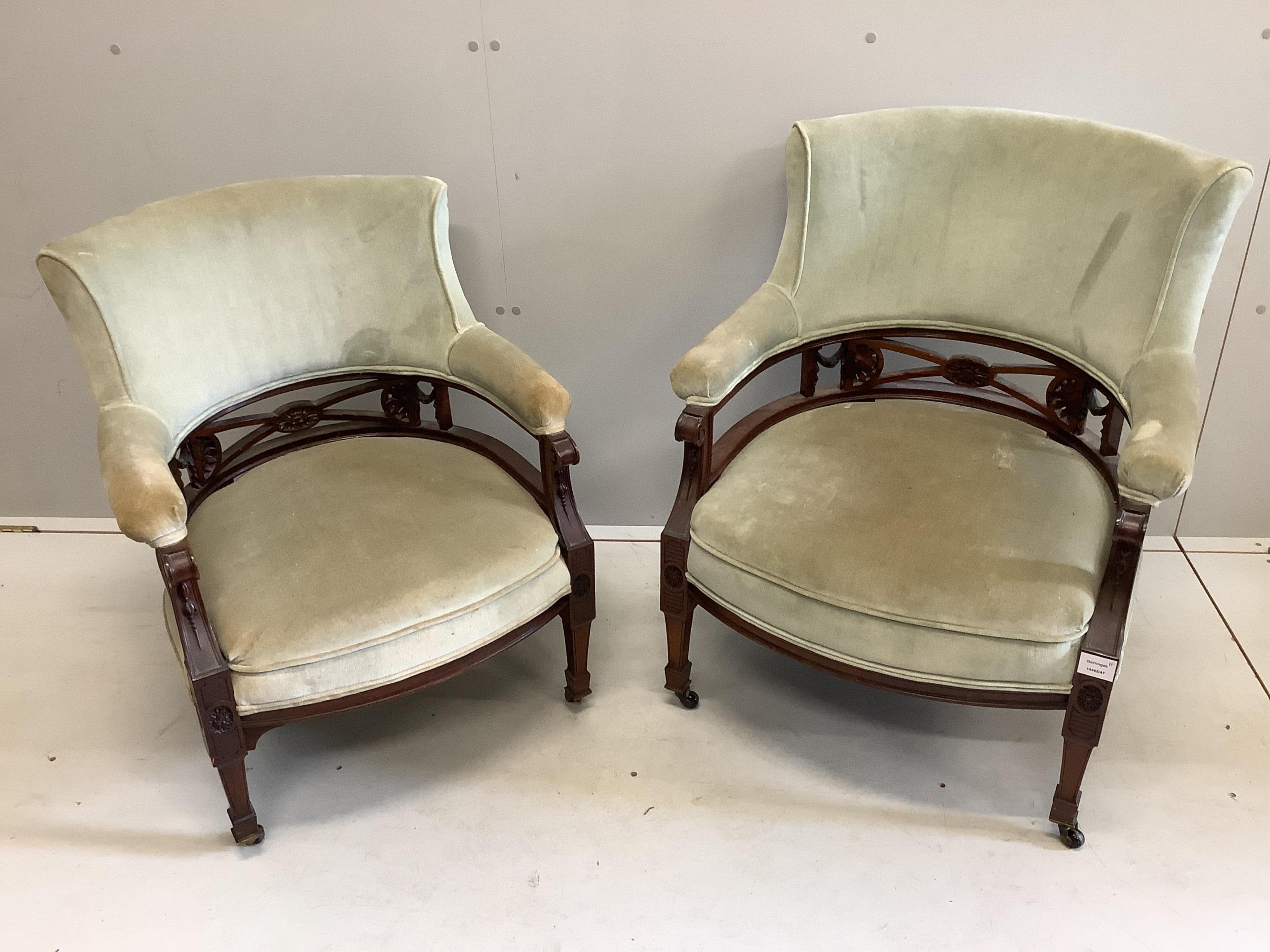 Two Victorian upholstered mahogany tub armchairs, larger width 65cm, depth 56cm, height 80cm. Condition - fair